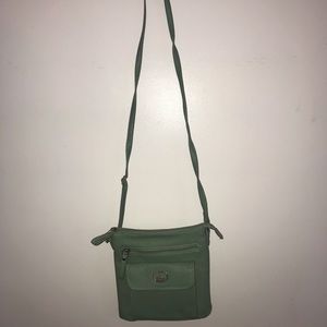 Teal shoulder purse with many compartments